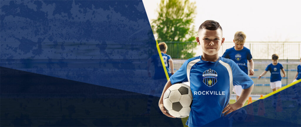 Boy in Rockville soccer jersey holding ball
